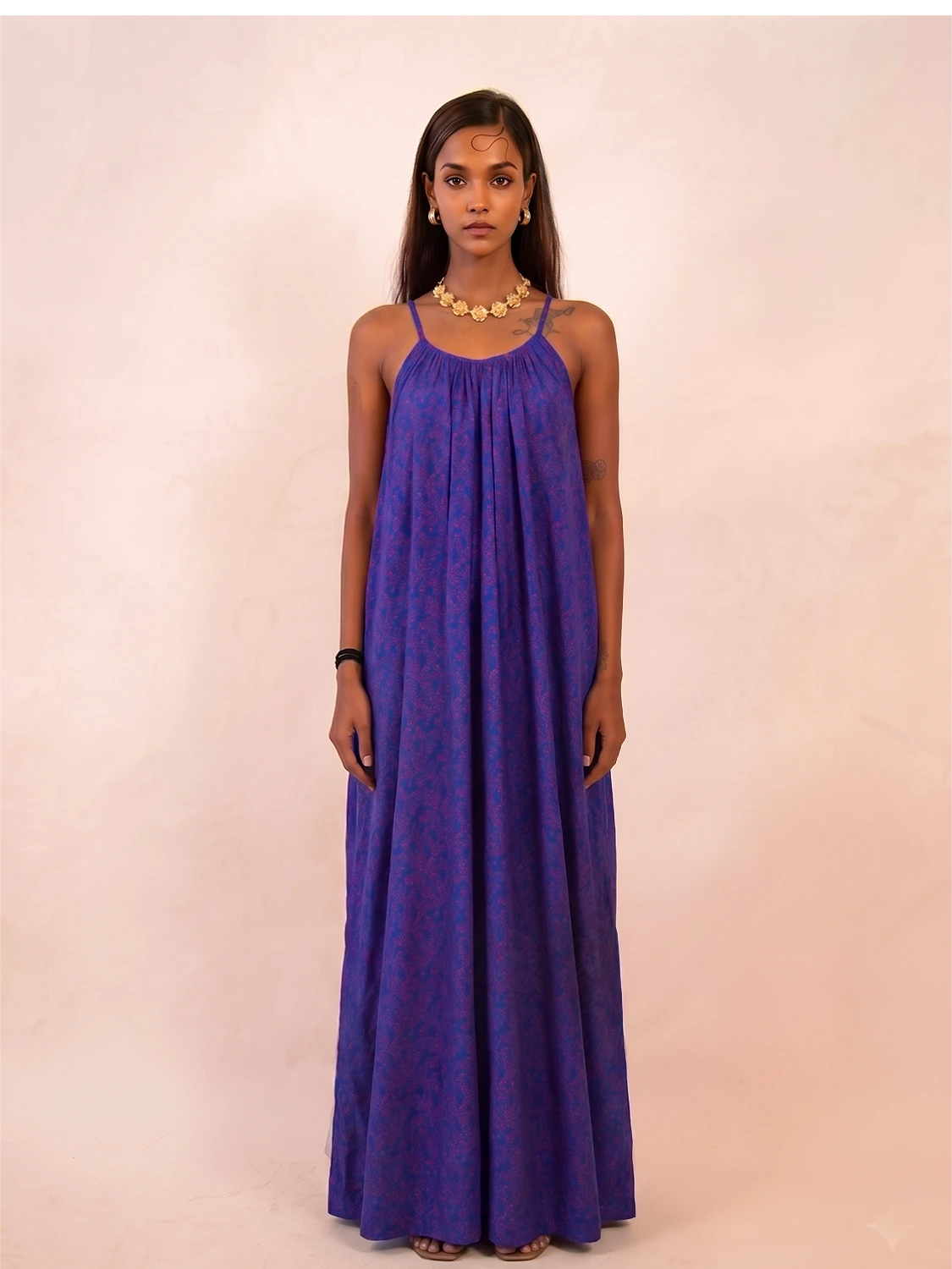 ZOYA is a one-of-a-kind slip dress handcrafted from a vintage silk saree, reimagined into something light, fluid, and enduring.