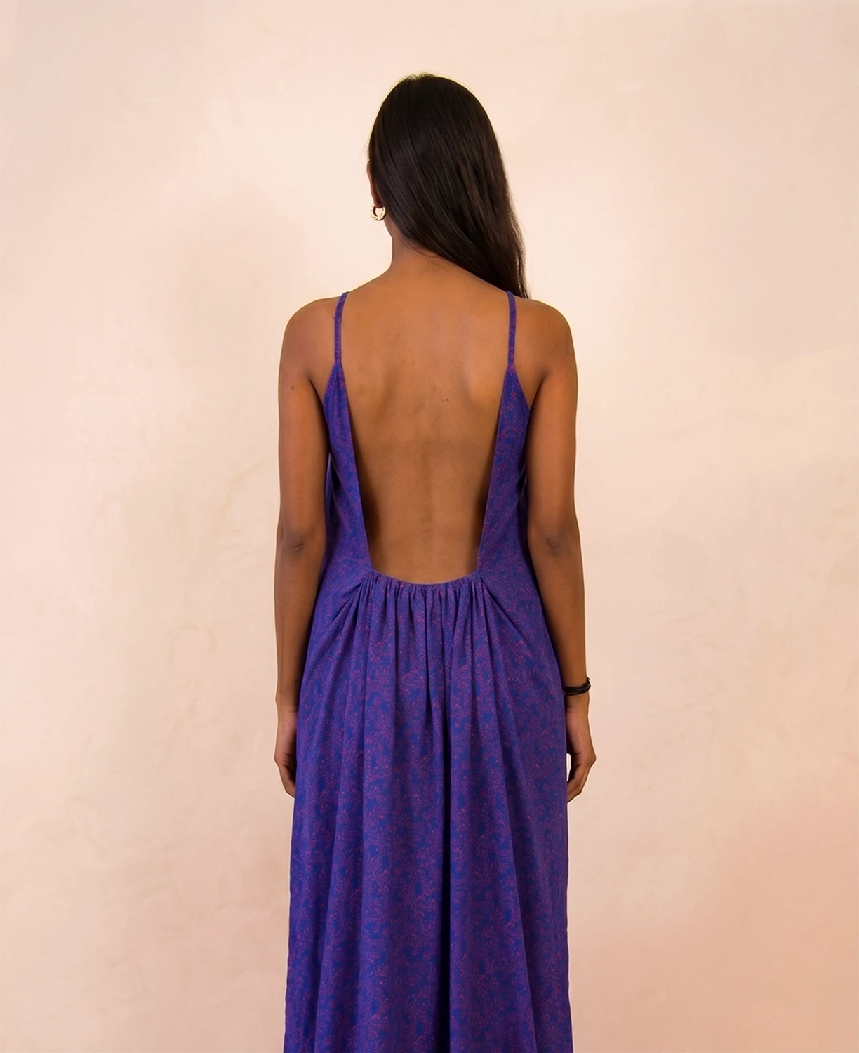 ZOYA is a one-of-a-kind slip dress handcrafted from a vintage silk saree, reimagined into something light, fluid, and enduring.